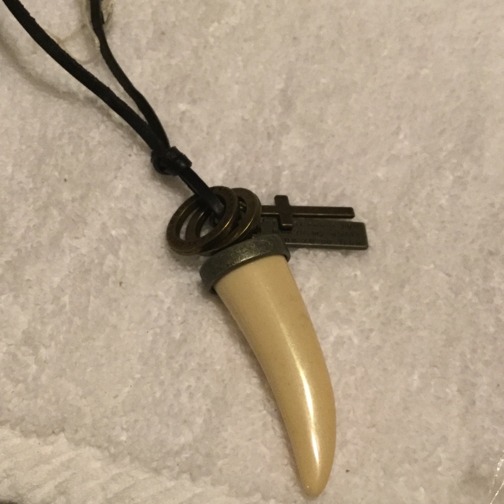 COPY - Man  hammers tooth necklace